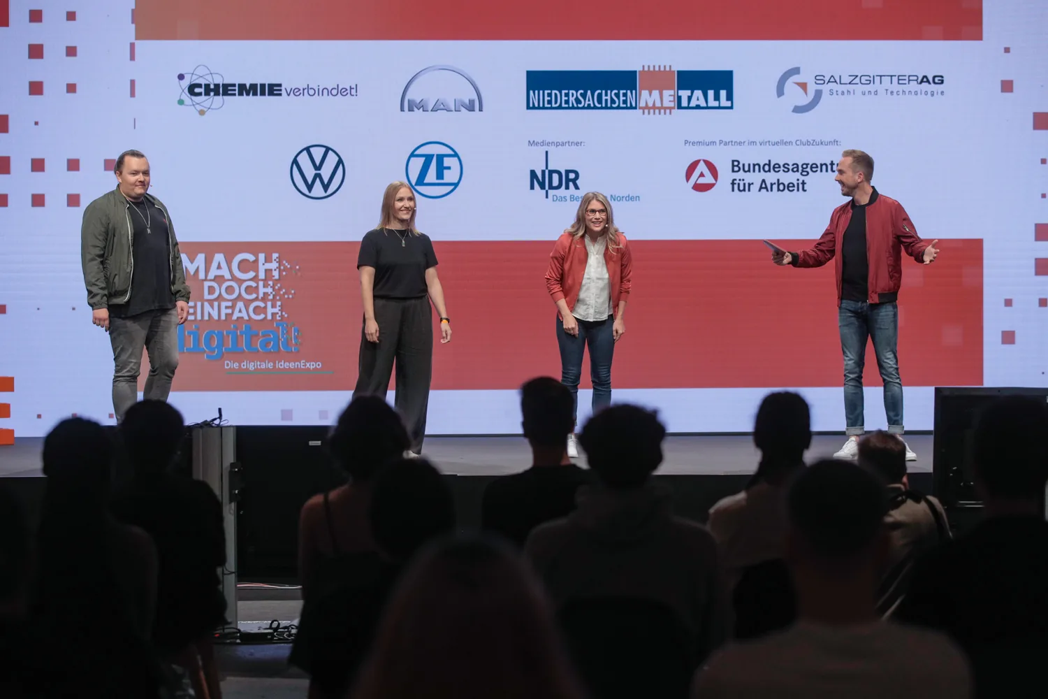 Host Felix Uhlig on the main stage of IdeenExpo 2021 in Hannover in front of an audience